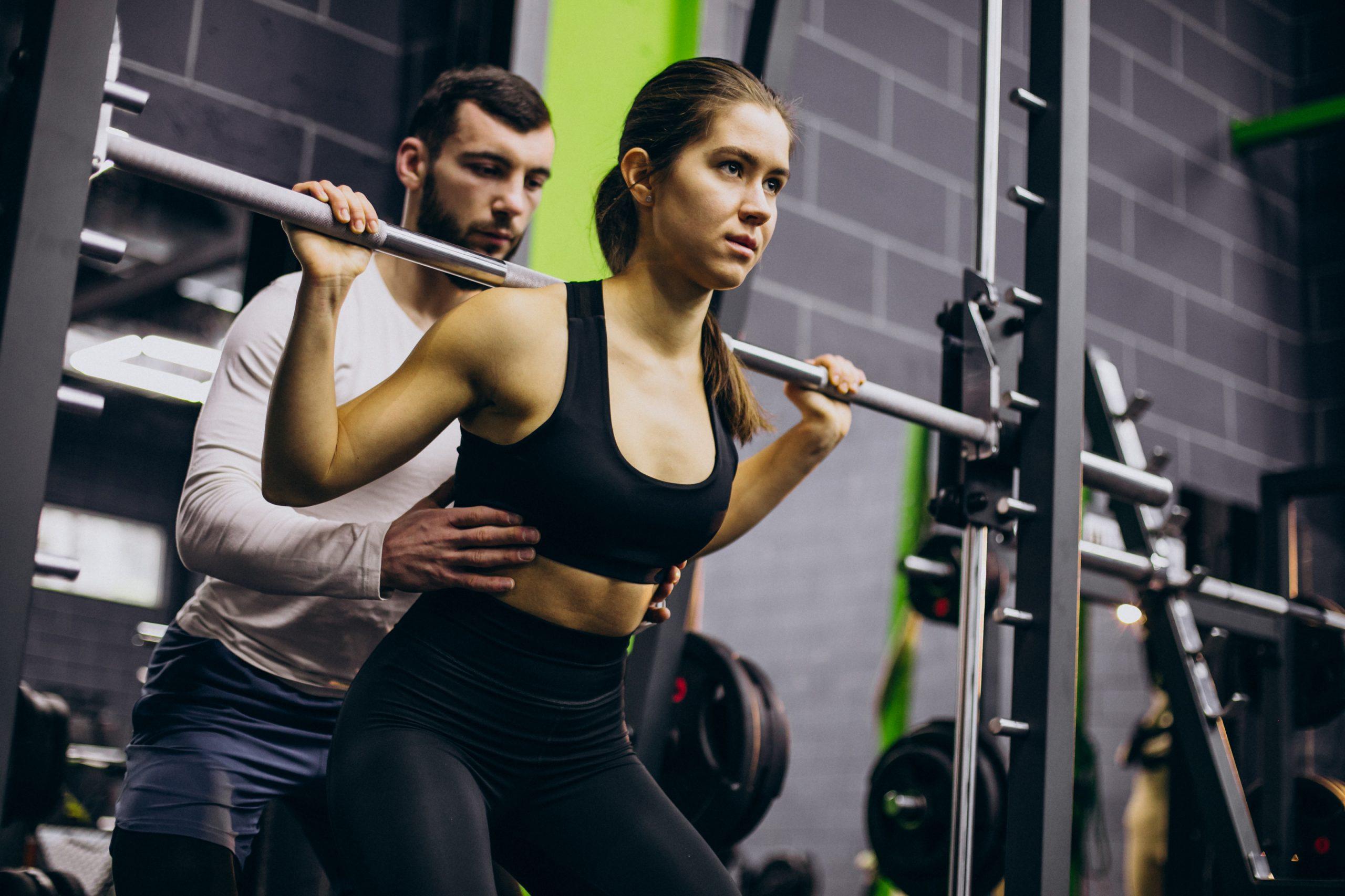 Couple training together at the gym